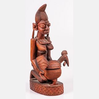 Yoruba Tribe Carved Figure of Woman with a Lidded Chicken