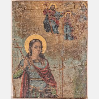 A Russian Painted Icon on Canvas Laid on Board