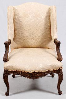 CARVED WALNUT OPEN ARMCHAIR