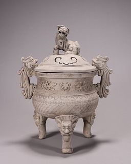 A Shiwan kiln porcelain suanni censer with dragon shaped ears