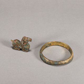 A group of copper goat and bracelet