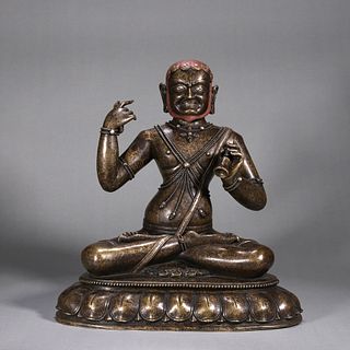 A copper silver-inlaid Tibetan buddha statue