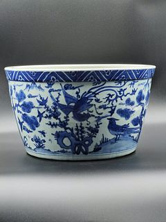 A blue and white bird and flower porcelain vat
