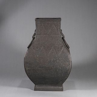 A dragon patterned copper vase