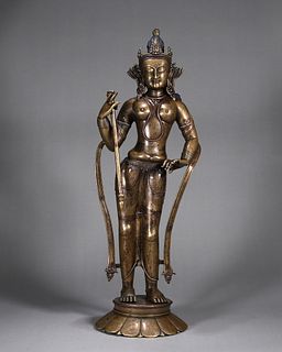 A copper silver-inlaid Tibetan buddha statue