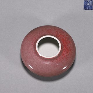 A red  porcelain water pot