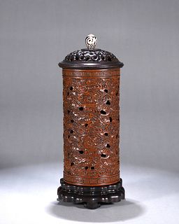A dzi bead-inlaid boxwood incense burner