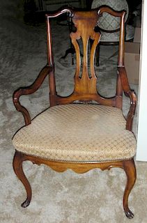 HAND CARVED WALNUT OPEN ARM CHAIR CIRCA 1930