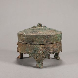 A bronze powder box