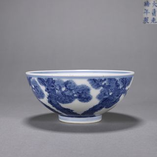 A blue and white pine tree porcelain bowl