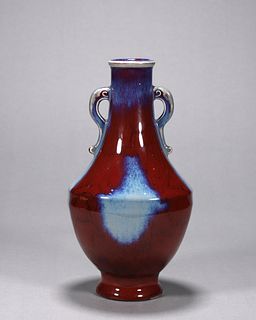 A glazed porcelain double-eared vase