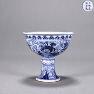 A blue and white seawater and deer porcelain cup