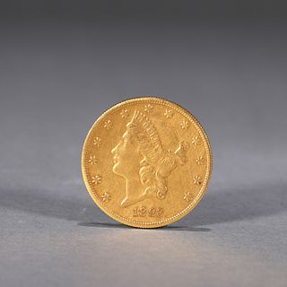 A figure patterned gold coin