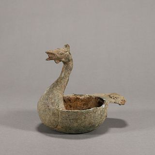 A duck shaped copper water pot