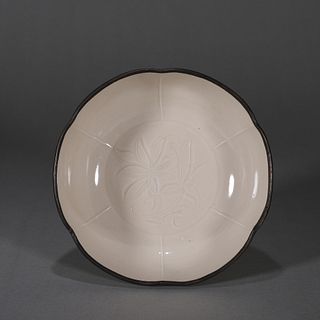 A flower carved Ding kiln white glazed porcelain bowl