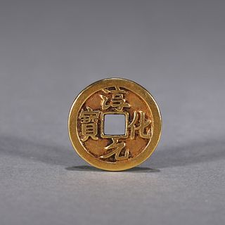 An inscribed buddha patterned gold coin