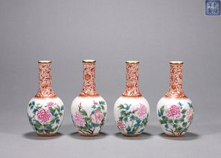 A group of famille rose peony porcelain vases