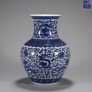 A blue and white interlocking flower and dragon porcelain vase