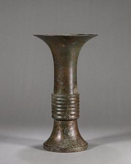 A copper beaker vase
