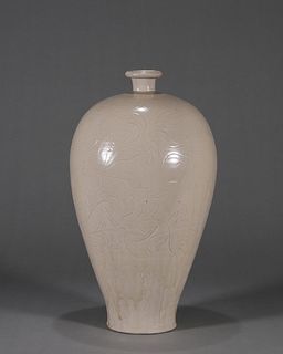 A flower carved Ding kiln white glazed porcelain meiping