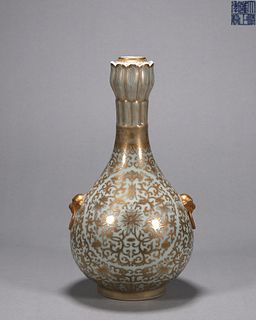 A gilt flower blue  porcelain vase