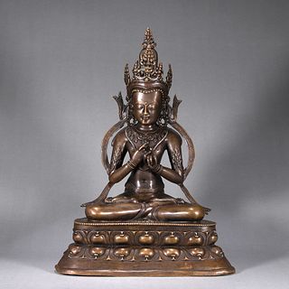 A copper silver-inlaid Tibetan Mahavairocana buddha statue