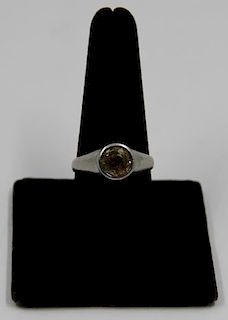 JEWELRY. Platinum & Solitaire Yellow Sapphire Ring