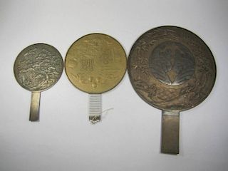 THREE ASIAN BRASS MIRRORS WITH HANDLES, MARKED