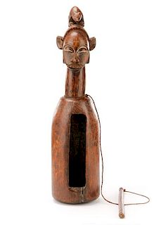 African Carved Figural Slit Drum or Ngoombu