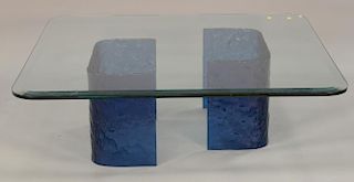Large glass coffee table, molded textured water glass bases in blue. ht. 16", top: 46" x 50".
