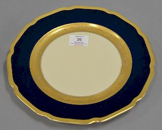Set of twelve Bohemia Royal ivory dinner plates with raised gold. dia. 10 1/2".