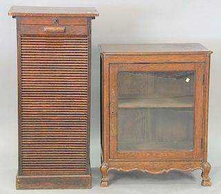 Two piece lot with oak roll door cabinet and small one door cabinet. ht. 42", wd. 26 1/2", dp. 14"; top: 15" x 20"