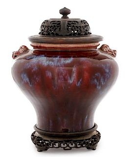 Chinese Oxblood Lidded Urn on Wooden Stand