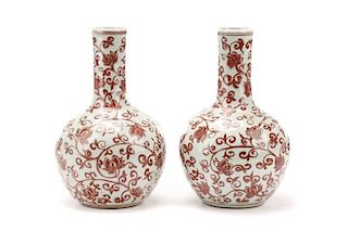 Pair Of Chinese Iron Red Floral Motif Bottle Vases