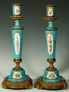 A PAIR BRONZE CANDLESTICKS WITH SEVRES TYPE PORCELAIN