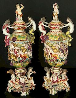 A 24-INCH PAIR OF 19TH C. CAPODIMONTE-TYPE BOLTED VASES