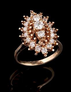A RADIANT DIAMOND AND 14K GOLD COCKTAIL RING