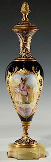 A CHAMPLEVE AND SEVRES-TYPE PORCELAIN VASE SIGNED BOST