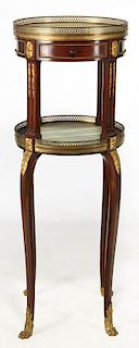 AN EARLY 20TH C. MAHOGANY GILT BRONZE MOUNTED STAND