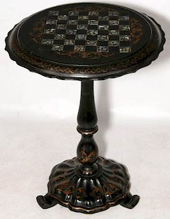 A VICTORIAN PAIER-MACHE AND GILT DECORATED GAMES TABLE