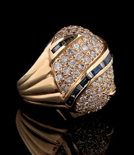 A 14K GOLD DIAMOND ENCRUSTED RING WITH SAPPHIRES