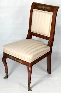 A FRENCH RESTORATION BRONZE MOUNTED SIDE CHAIR