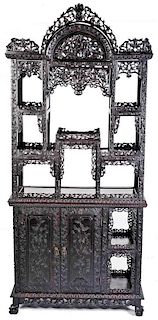A 19TH C. CHINESE CARVED ROSEWOOD DISPLAY CABINET