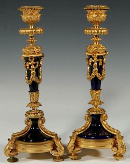 A PAIR ORMOLU CANDLESTICKS WITH SEVRES TYPE PORCELAIN