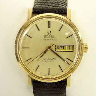 Vintage Men's Omega 14 Karat Yellow Gold Seamaster de Ville Automatic Movement Watch with Lizard Strap.