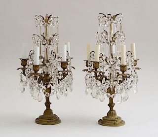 PAIR OF LOUIS XV STYLE CUT-GLASS-MOUNTED GILT-METAL FIVE-LIGHT CANDELABRA, MOUNTED AS LAMPS