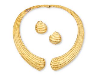 A set of gold hammered jewelry