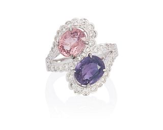 A pink sapphire, purple sapphire and diamond ring