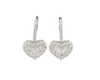 A pair of diamond heart earrings