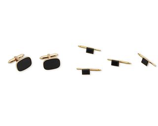 A pair of onyx cufflinks and shirt studs